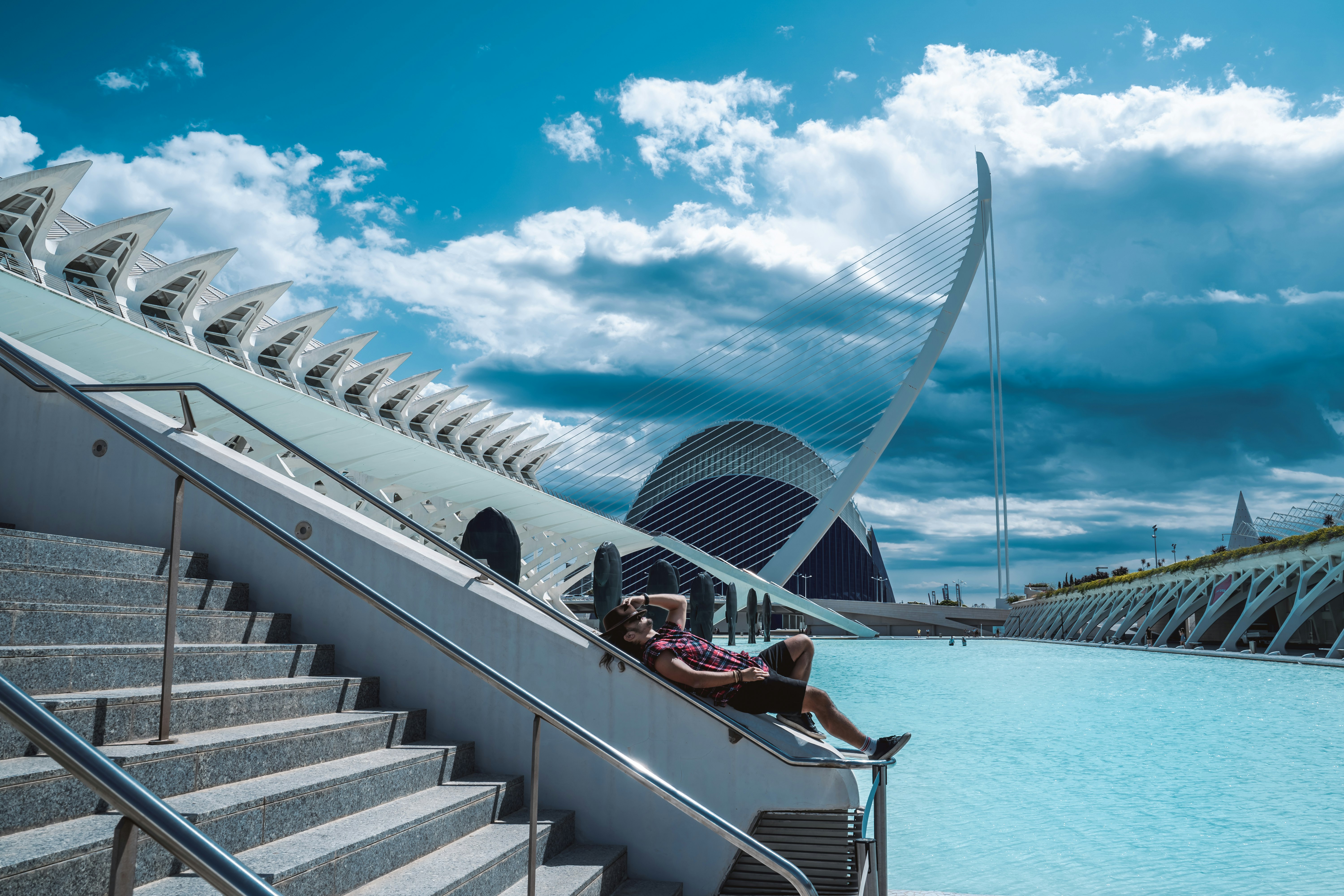 white and blue boat on body of water during daytime